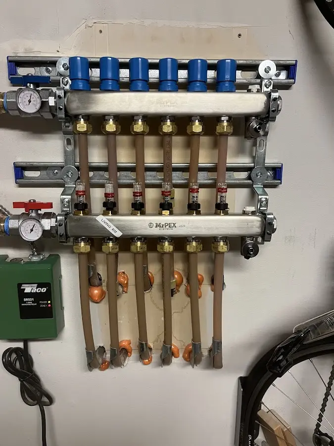 Plumber performing Water Heater Repair at a residential property in Arden Hills